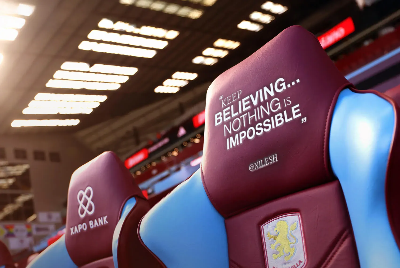 Claret and blue stadium seats. One carries a fan’s message, “Keep believing… nothing is impossible”, another the Xapo Bank logo.